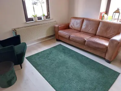 Ein Sitzbereich in der Unterkunft Feriënhaus Hohe Acht