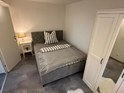 Ein Bett oder Betten in einem Zimmer der Unterkunft Ferienwohnung Meister