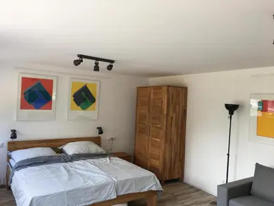 Ein Bett oder Betten in einem Zimmer der Unterkunft Gästehaus - Kunststiftung Bernhard Müller-Feyen