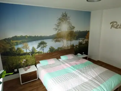 Ein Bett oder Betten in einem Zimmer der Unterkunft Haus Eifelruhe