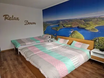 Ein Bett oder Betten in einem Zimmer der Unterkunft Haus Eifelruhe