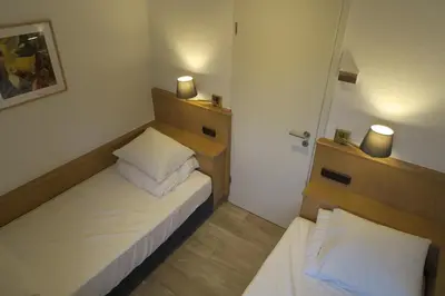 Ein Bett oder Betten in einem Zimmer der Unterkunft Landhaus 906