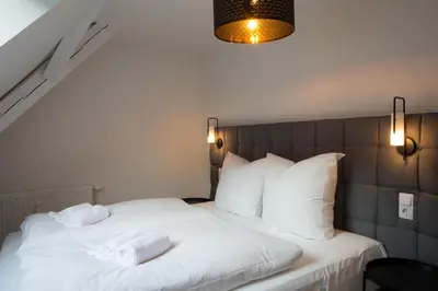 Ein Bett oder Betten in einem Zimmer der Unterkunft Ferienwohnung Vino