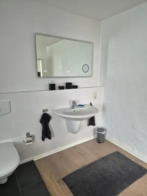 Ein Badezimmer in der Unterkunft Hinter'm Mäuerchen