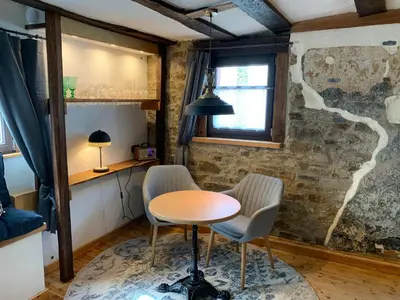 Ein Sitzbereich in der Unterkunft Ferienhaus Eifelstuben mit Charme - Bauernstube Vulkaneifel - Nähe See und Burgruine