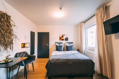 Ein Bett oder Betten in einem Zimmer der Unterkunft Premium Apartments Koblenz