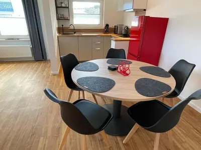 Ein Sitzbereich in der Unterkunft Südschleife Appartements - App. 2 - WLAN - Direkt am Ring