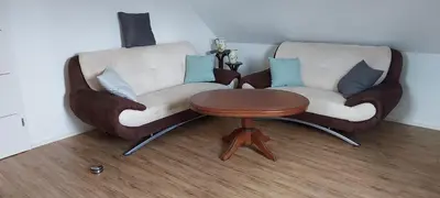 Ein Sitzbereich in der Unterkunft Haus Erika