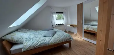 Ein Bett oder Betten in einem Zimmer der Unterkunft Haus Erika