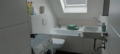Ein Badezimmer in der Unterkunft Haus Erika