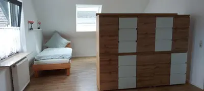 Ein Bett oder Betten in einem Zimmer der Unterkunft Haus Erika