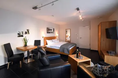 Ein Bett oder Betten in einem Zimmer der Unterkunft Weingut Heinen