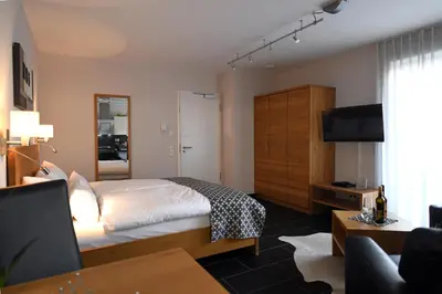 Ein Bett oder Betten in einem Zimmer der Unterkunft Weingut Heinen
