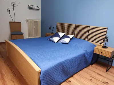 Ein Bett oder Betten in einem Zimmer der Unterkunft Ferienwohnungen Evelyne