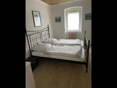 Ein Bett oder Betten in einem Zimmer der Unterkunft NEU! Ferienhaus Helena