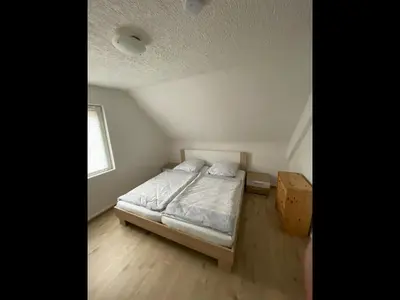 Ein Bett oder Betten in einem Zimmer der Unterkunft NEU! Ferienhaus Helena