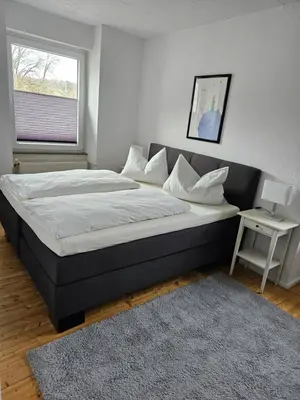 Ein Bett oder Betten in einem Zimmer der Unterkunft Große PRIVATE SPA WELLNESS Ferienwohnung in KOBLENZ NÄHE ZUM RHEIN