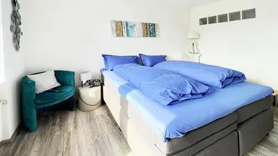 Ein Bett oder Betten in einem Zimmer der Unterkunft Gästehotel Lucendi Premium Lounge