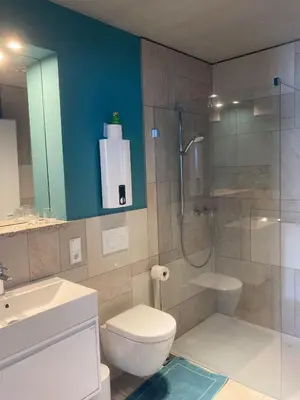 Ein Badezimmer in der Unterkunft Querhaus Kanzem