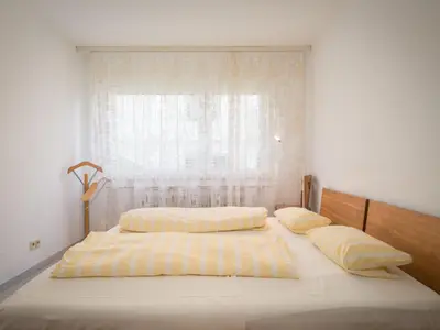Ein Bett oder Betten in einem Zimmer der Unterkunft Apartment Terrassenwohnung am Kurpark by Interhome
