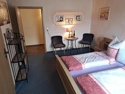 Ein Bett oder Betten in einem Zimmer der Unterkunft Moselpension Gwosch