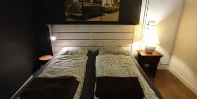Ein Bett oder Betten in einem Zimmer der Unterkunft Ferienwohnung an der Mosel, Postamt