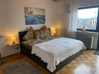 Ein Bett oder Betten in einem Zimmer der Unterkunft Ferienwohnung Seebrise Bostalsee