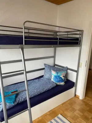 Ein Bett oder Betten in einem Zimmer der Unterkunft Ferienwohnung Seebrise Bostalsee