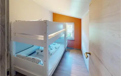 Ein Bett oder Betten in einem Zimmer der Unterkunft Lovely Apartment In Burgen With Wifi