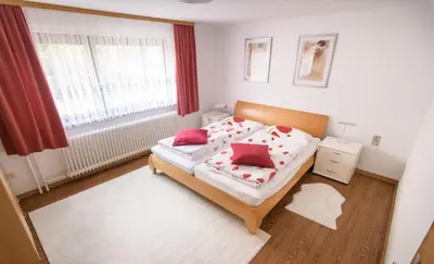 Ein Bett oder Betten in einem Zimmer der Unterkunft Ferienwohnung Richards