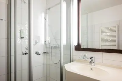 Ein Badezimmer in der Unterkunft Uferdeck - Boutique Hotel