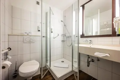 Ein Badezimmer in der Unterkunft Uferdeck - Boutique Hotel