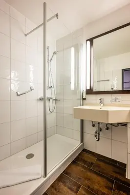 Ein Badezimmer in der Unterkunft Uferdeck - Boutique Hotel