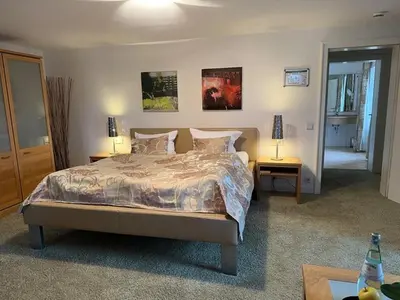 Ein Bett oder Betten in einem Zimmer der Unterkunft Zum Simonbräu