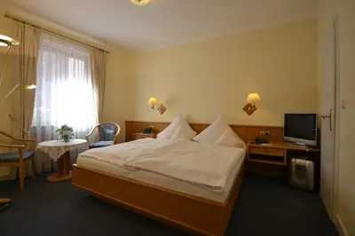 Ein Bett oder Betten in einem Zimmer der Unterkunft Hotel Binz