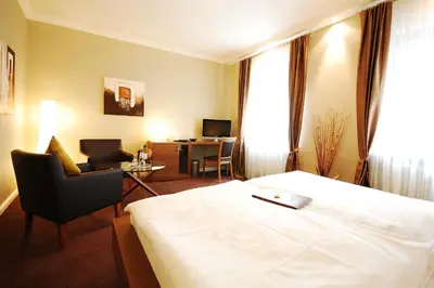 Ein Bett oder Betten in einem Zimmer der Unterkunft Hotel Binz