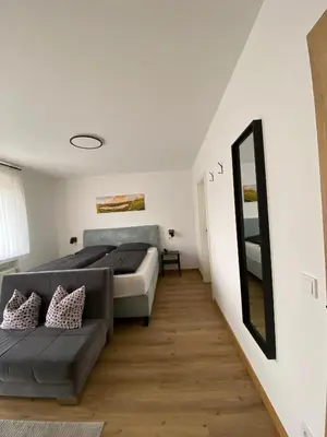 Ein Bett oder Betten in einem Zimmer der Unterkunft Weingut Lehnert-Später