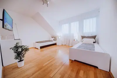 Ein Bett oder Betten in einem Zimmer der Unterkunft Große 3 Zimmer Ferienwohnung Koblenz Wallersheim mit PKW Stellplatz