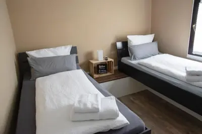 Ein Bett oder Betten in einem Zimmer der Unterkunft B&B Malú am Ring