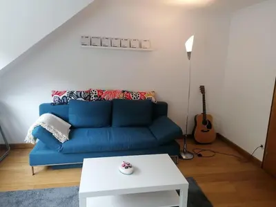 Ein Sitzbereich in der Unterkunft Schöne Wohnung im Jugendstilhaus im Weltkulturerbe