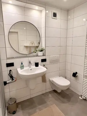 Ein Badezimmer in der Unterkunft JUPAS - Premium Apartments Trier