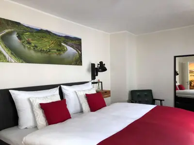 Ein Bett oder Betten in einem Zimmer der Unterkunft Ferienhaus-Am-Alten-Stadttor