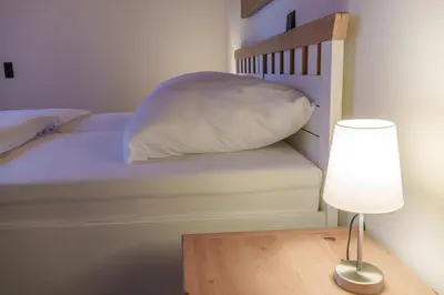 Ein Bett oder Betten in einem Zimmer der Unterkunft Casa Benedicta