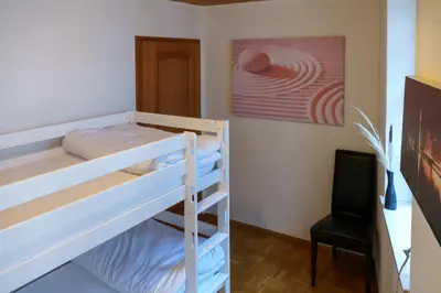 Ein Bett oder Betten in einem Zimmer der Unterkunft Casa Benedicta