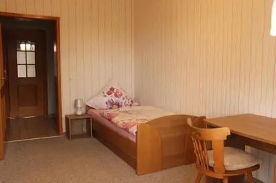Ein Bett oder Betten in einem Zimmer der Unterkunft Ferienwohnung Mietzner