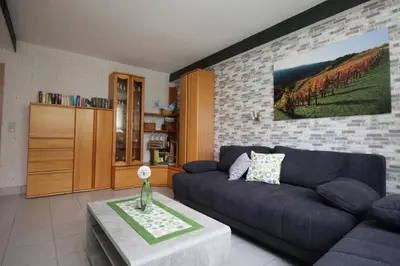 Ein Sitzbereich in der Unterkunft NEU! 3 Sterne Ferienwohnung Loreley DTV Klassifizierung