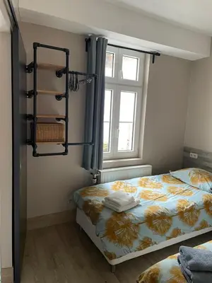 Ein Bett oder Betten in einem Zimmer der Unterkunft Excellent house