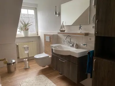 Ein Badezimmer in der Unterkunft Ferienwohnung WERTevoll