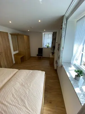 Ein Bett oder Betten in einem Zimmer der Unterkunft Ferienhaus Freimuth