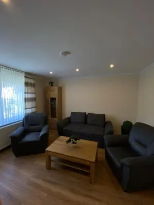 Ein Sitzbereich in der Unterkunft Ferienhaus Freimuth